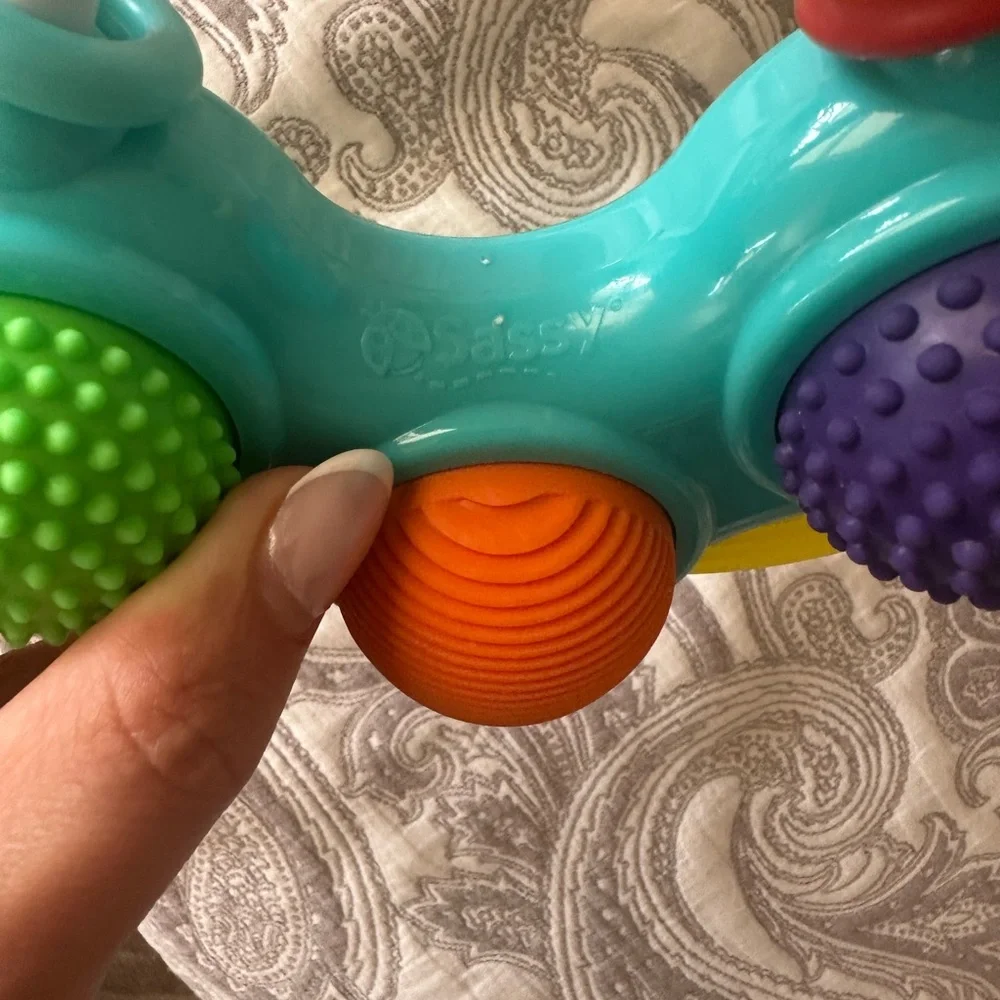 Green and Purple Learning Sensory and teething Toy